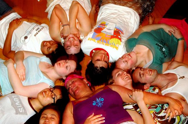Kirk rests with students during a session of Ecstatic Dance. Photo courtesy of Christina Ries