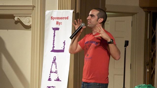 Comedian Dan Ahdoot makes a second appearance at Linfield, performing a skit about culture in light of Diversity Week on Nov. 6 in Ice Auditorium. Joel Ray/Freelancer