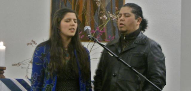Father and daughter Julio (left) and Camila Matamala-Ost sing “Oh God My Adored One” on Feb. 27. Sarah Hansen /For the Review