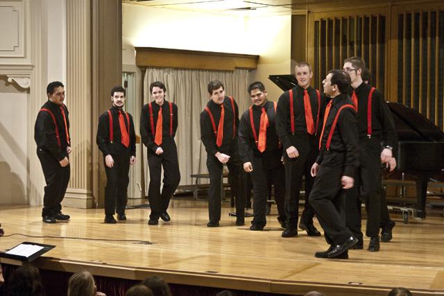 Members of the Wildcat Men’s Glee Club sway as they sing in Ice Auditorium during the last performance in their Spring Break tour April 1. They performed a variety of pieces, including a song from “The Little Mermaid.” Katie Pitchford/Photo editor