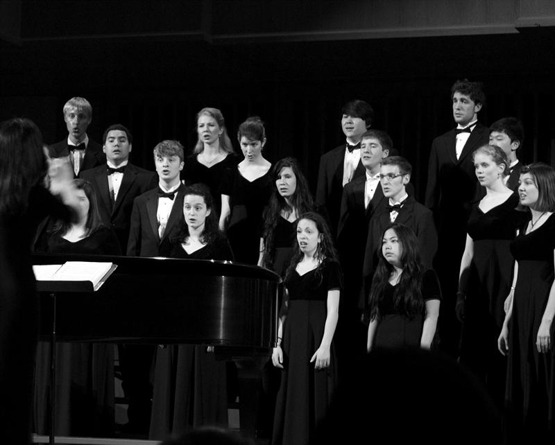 The Linfield Concert Choir performs during its April 4 homecoming concert in Ice Auditorium. Kate Straube/Photo editor
