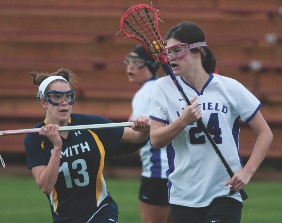 Senior Lynette Cole scoops a ground ball for the Wildcats during the March 17 match against Smith College.
Tyson Takeuchi/Senior photographer