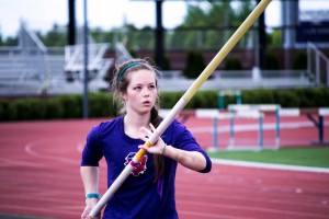 Junior Amanda Gibbon prepares to take a jump in the women's pole vault event. Gibbon cleared a height of 3.05 meters which put her on the Linfield top ten list.