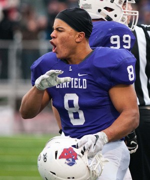 Spencer Payne '17 celebrates after Alex Hoff's '16 fumble recovery for the Wildcats.