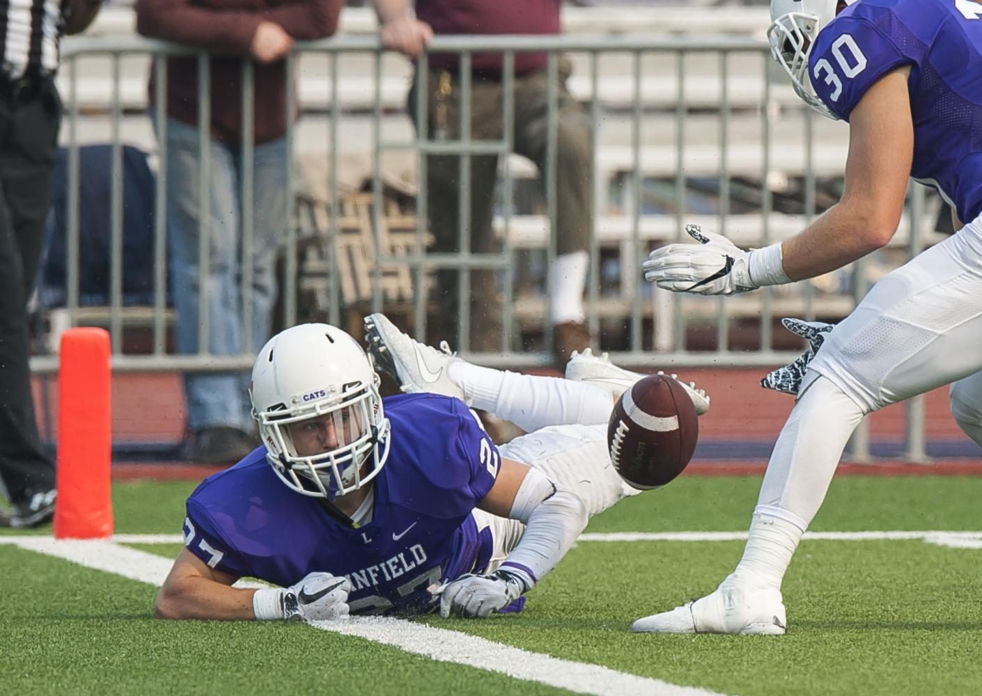 Linfield’s Keegan Weiss just fails to down a 48-yard punt by Colton Ramos inside the 1-yard line in the Wildcat’s final drive of the third quarter. Mary Hardin-Baylor led 17-3 at the time and won the game 24-3.
