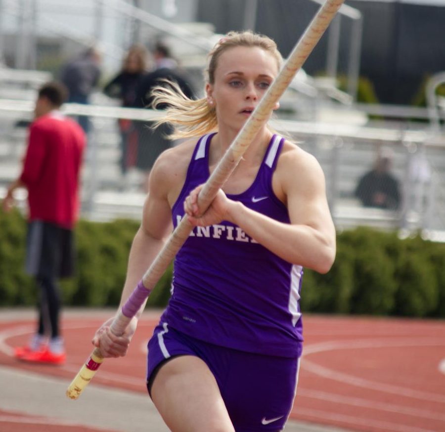 Junior+Olivia+McDaniel+in+her+mid-approach+pole+vault+run+at+the+Linfield+Open+over+the+weekend.+She+placed+first+in+the+pole+vault+giving+her+a+national+ranking.