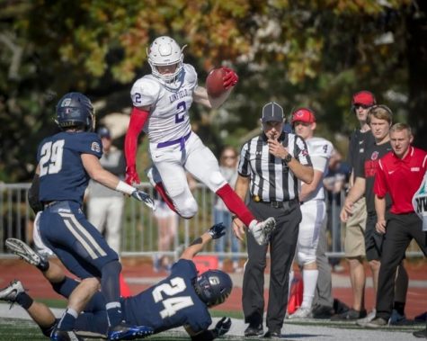 Linfield wide receiver J.D. Lasswell makes a first-quarter catch for eight yards and a first down as the No. 24-ranked Wildcats defeated the George Fox Bruins 14-0 Saturday in Newberg for the team’s third consecutive win. Lasswell led Linfield’s receivers with five receptions for 36 yards. 