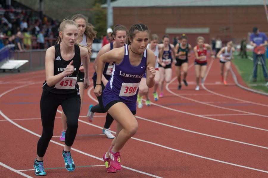 Anne Ferguson, ‘19, jolting of the line for the 800-meter.