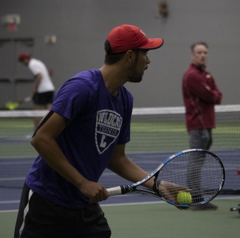 Nathan Saragoza, ‘19, plays in his last doubles match with Luis Rojas, ‘20 here at Linfield and wins in a close match against Willamette.