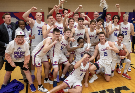 The Wildcats join together to take a photograph in celebration of winning the Northwest Conference