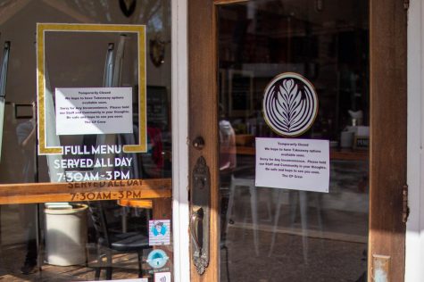 Community Plate, a popular hangout restaurant, hangs a sign on the door saying they are temporarily closed but hopes to have food available for takeout soon. Wednesday, April 8, 2020. 