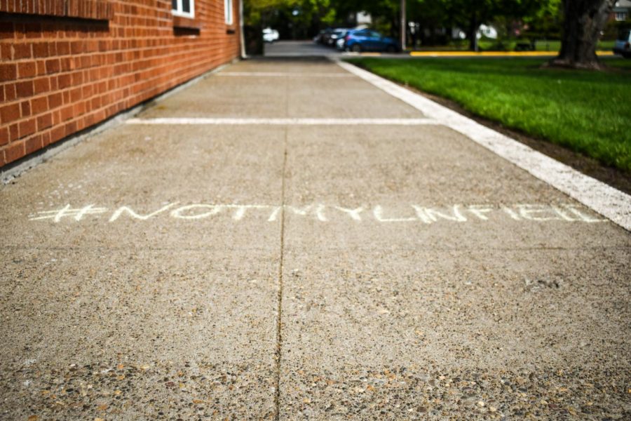 Sidewalks around campus were filled with chalk drawings in protest of Professor Daniel Pollack-Pelzners termination. 