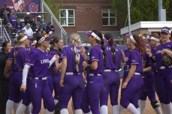 The Linfield Softball team, who went 43-8 on the season, celebrate at Del Smith Stadium